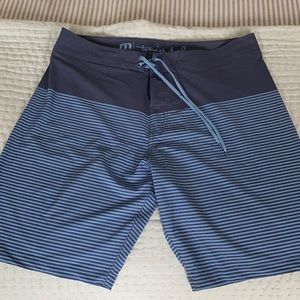 TravisMathew men’s board shorts